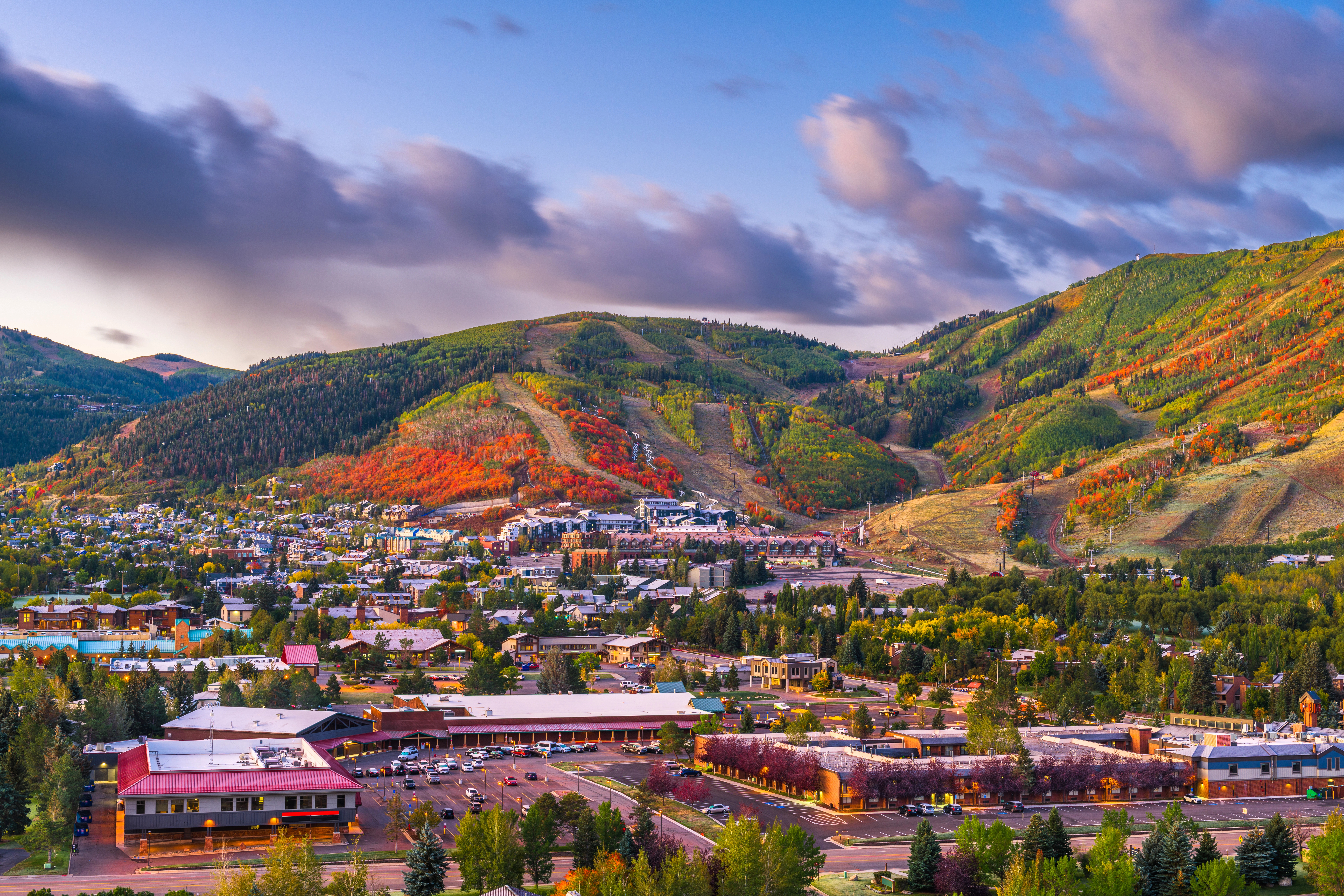 Heber City Roofing Services – Top Rated Roofs Aerial view of Heber City, Utah with homes and rooftops surrounded by mountains